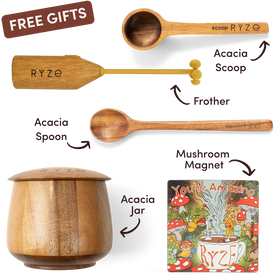 Set of wooden accessories with labels and a colorful magnet on a white background