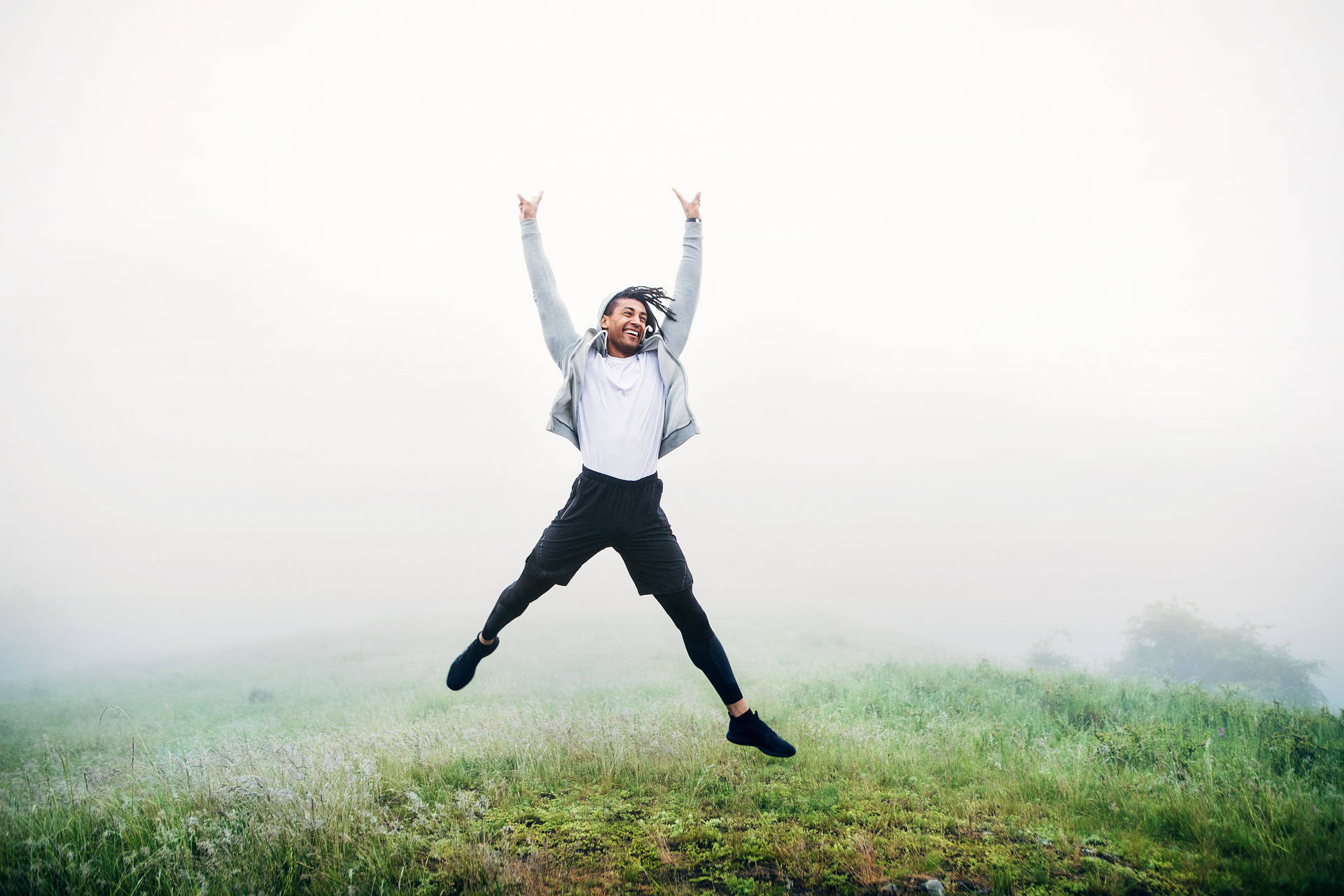 Young man jumping outside