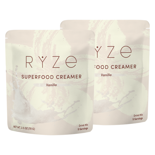 Two packages of RYZé Superfood Creamer Vanilla on a white background