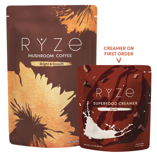 Two stand-up pouches of RYZE coffee and a Mocha creamer pouch on a white background, with a text callout reading 'CREAMER ON FIRST ORDER' pointing to the smaller pouch.