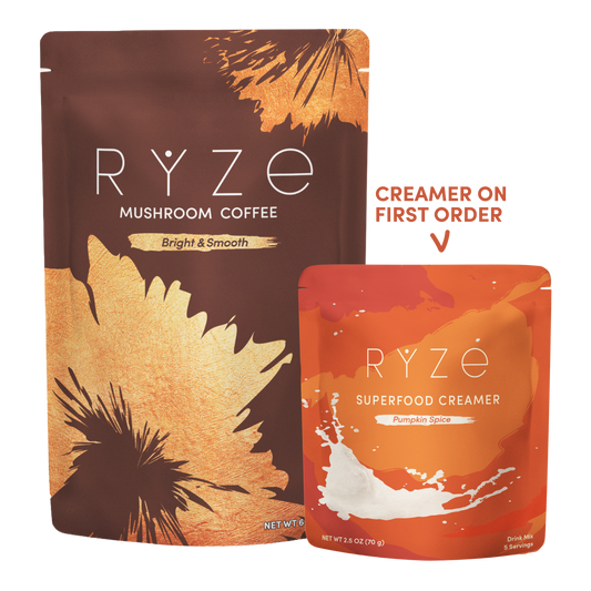 Two RYZE-branded pouches on a white background: a larger brown and gold Mushroom Coffee pouch and a smaller orange and orange-red Superfood Creamer pouch, with text reading 'CREAMER ON FIRST ORDER' and a checkmark.