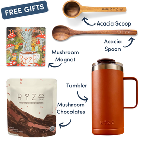 A gift set collage on a white background showing labeled items: two wooden spoons engraved with RYZE, a colorful mushroom magnet, a pouch of RYZE mushroom chocolates, and an orange-brown insulated tumbler with a lid. A blue 'FREE GIFTS' banner appears at the top left.