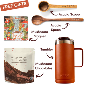 A promotional collage for the RYZE brand showing a rust-orange insulated tumbler with a handle, two wooden spoons labeled Acacia Spoon and Acacia Scoop, a mushroom magnet, a pouch of RYZE Mushroom Chocolates, and a 'FREE GIFTS' banner on a white background with labeled callouts.