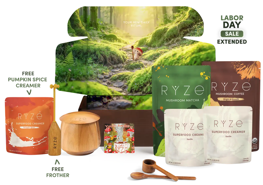 A RYZE Labor Day sale gift set featuring a forest-themed box, mushroom matcha and coffee pouches, two pouches of superfood creamer, a wooden spoon, a small wooden container, and a free pumpkin spice creamer pouch with a free fruther card, all arranged on a white background with sale text.
