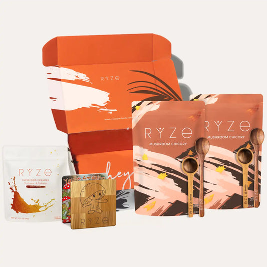RYZE product packaging including boxes, bags, and a card on a white background