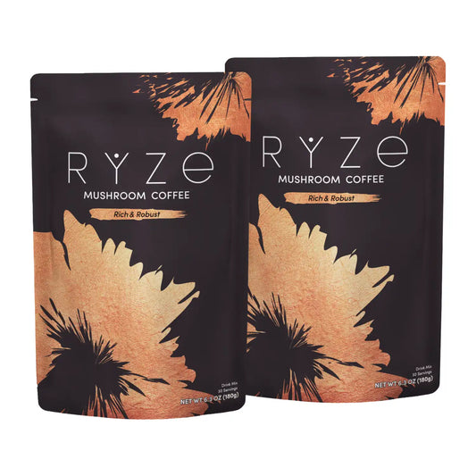 Two stand-up pouches of RYZE Dark Roast Mushroom Coffee, Rich & Robust flavor, displayed against a plain white background.