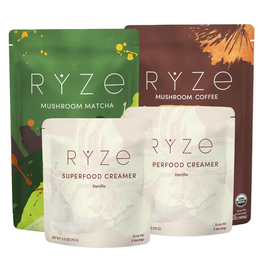 Four RYZE branded stand-up pouches arranged together on a white background: Mushroom Matcha in green, Mushroom Coffee in brown, and two creamer pouches in front labeled Superfood Creamer, Vanilla.