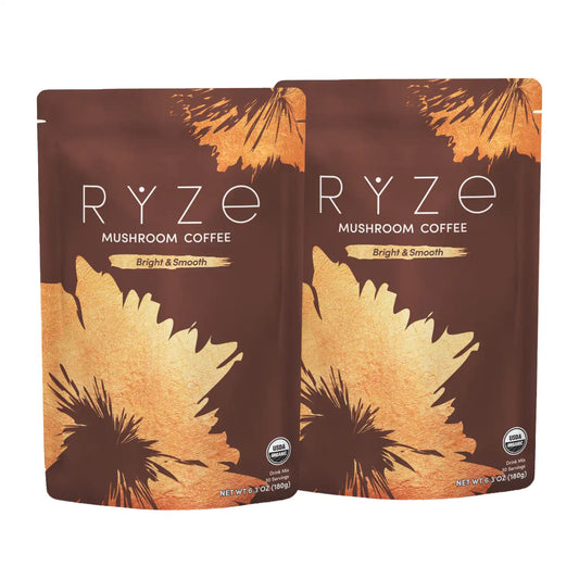 Two stand-up pouches of RYZE Mushroom Coffee, Bright & Smooth flavor, shown on a plain white background.