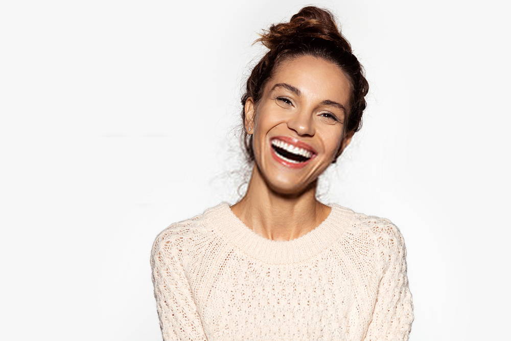 beautiful woman smiling widely