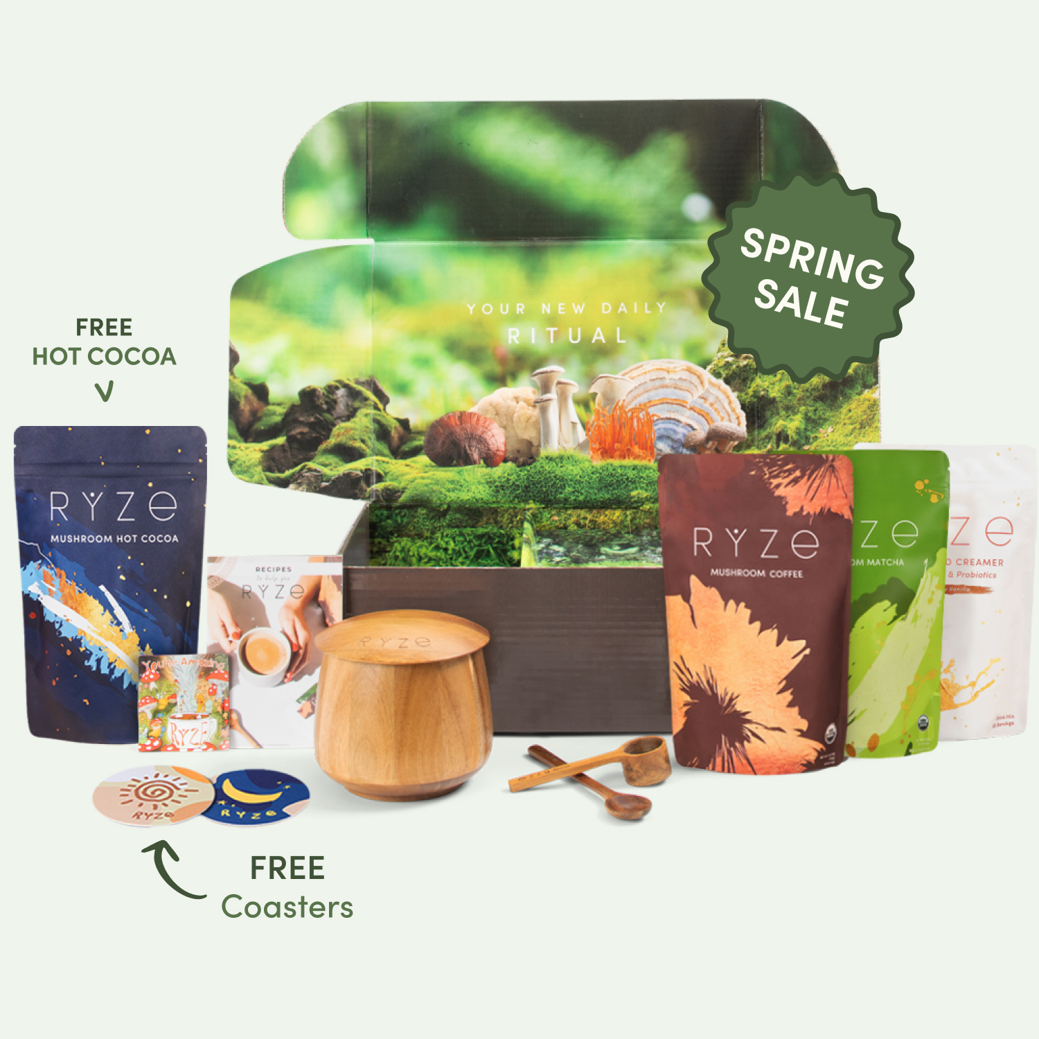 Assorted Ryze mushroom coffee products with packaging and wooden scoops.