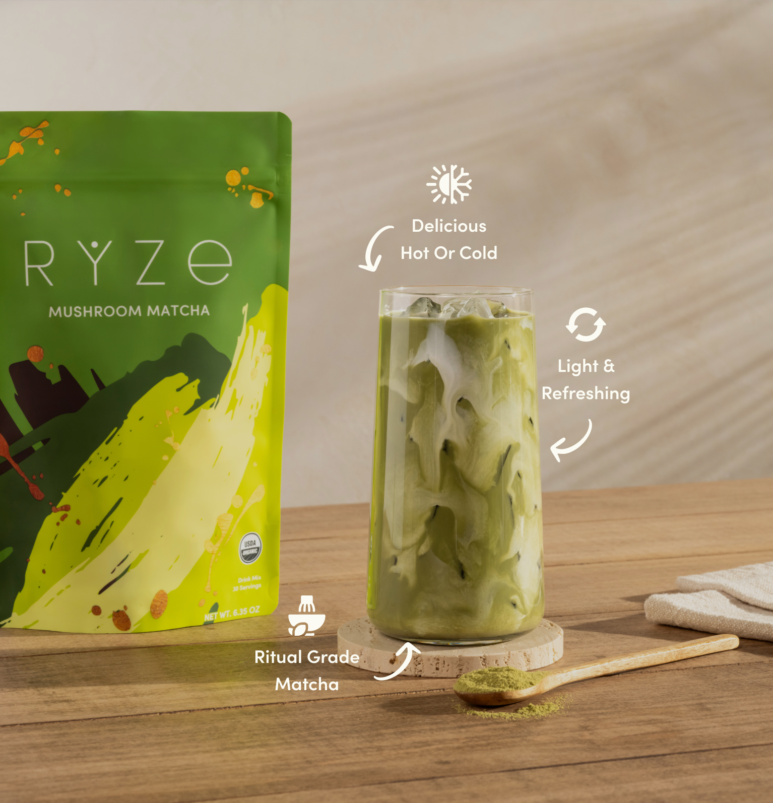 Green matcha drink with a package labeled 'RYZE Mushroom Matcha' on a wooden table.
