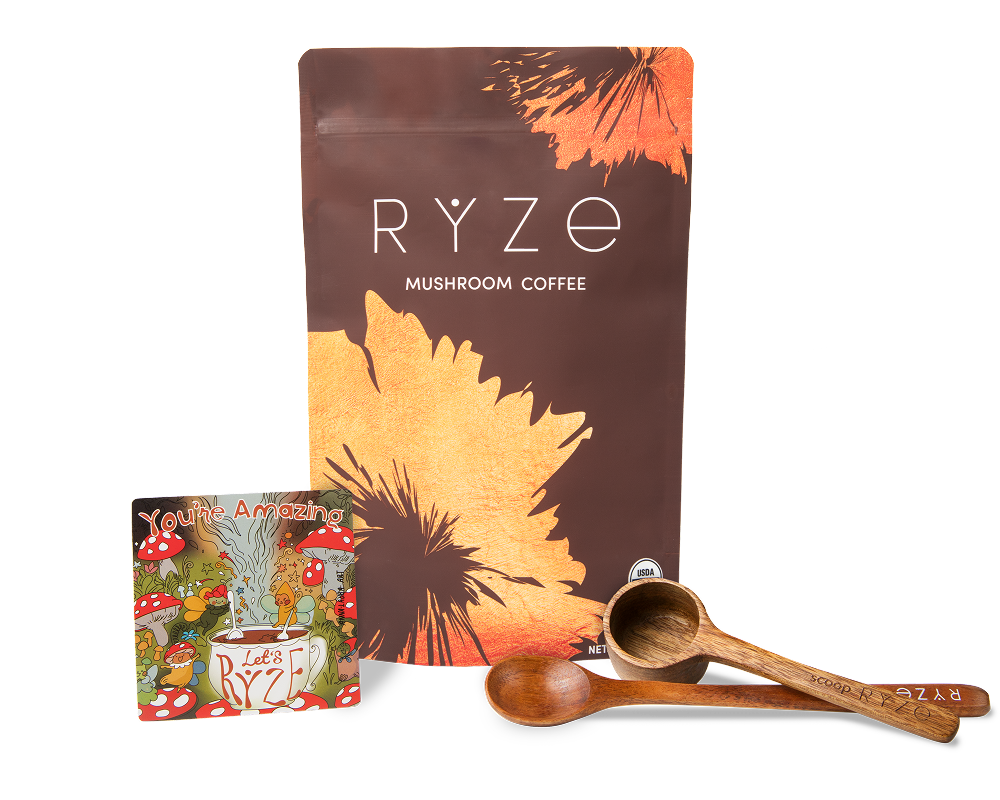 RYZE mushroom coffee packaging with wooden scoops and a vibrant decorative card.