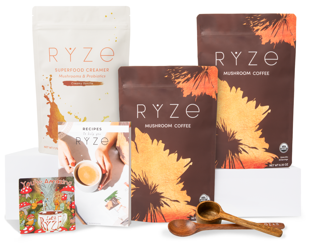 Rye mushroom coffee and creamer with a recipe booklet and wooden spoons.